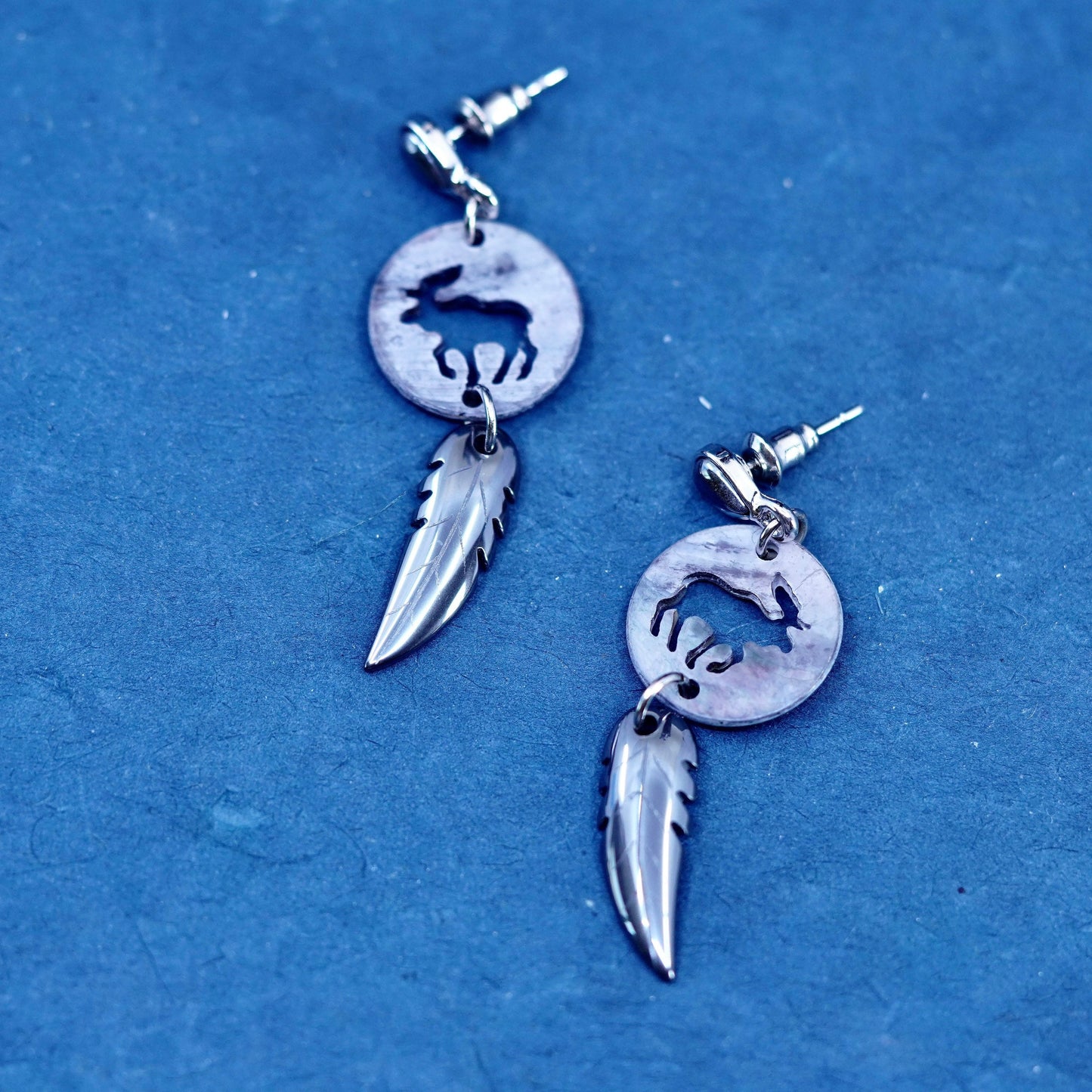 Silver Tone handmade earrings with abalone elk cut out hematite feather dangles