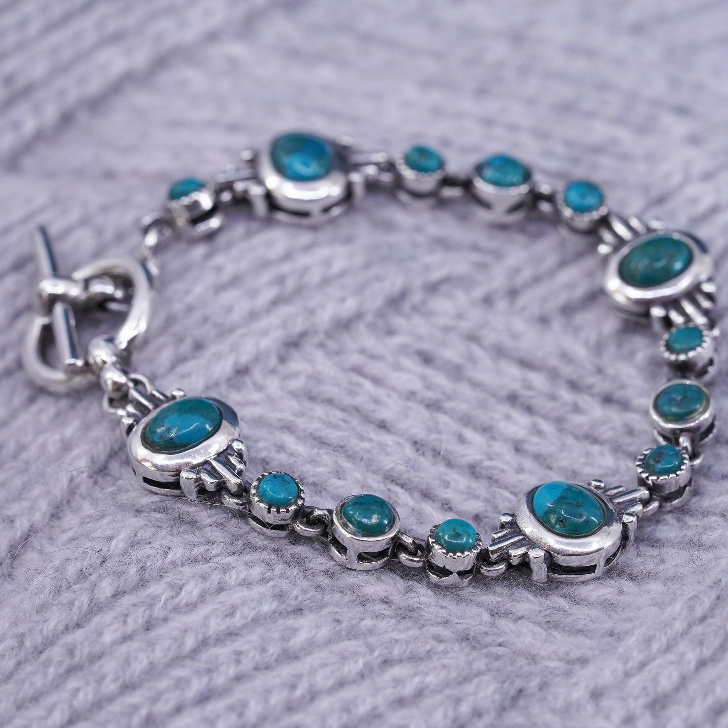 6.75”, sterling 925 silver handmade bracelet with turquoise and toggle closure