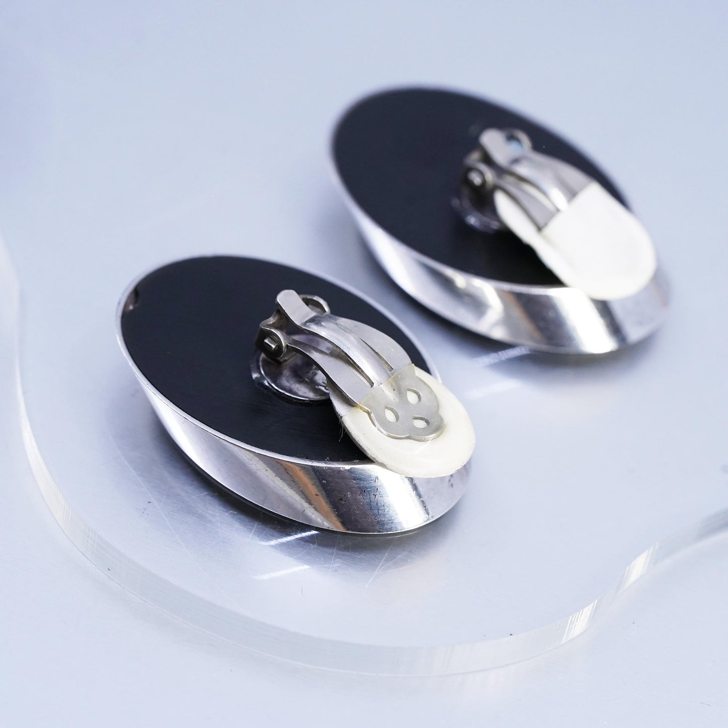 Vintage Varga Sterling Silver Oval Clip On Earrings with onyx and spiral inlay