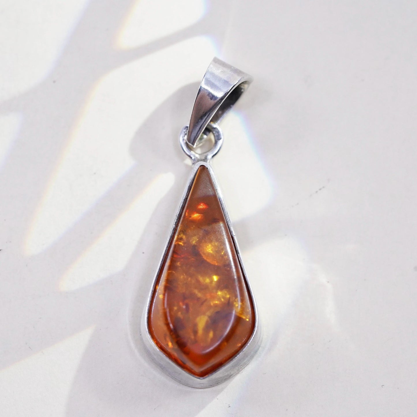 Vintage sterling 925 silver handmade pendant with amber nugget