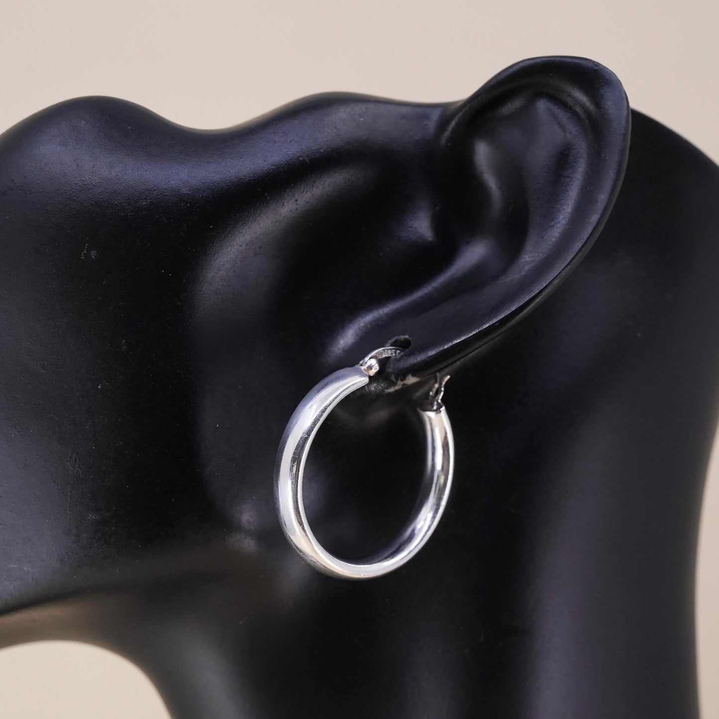 1.25” sterling silver loop single earring, textured minimalist primitive hoop