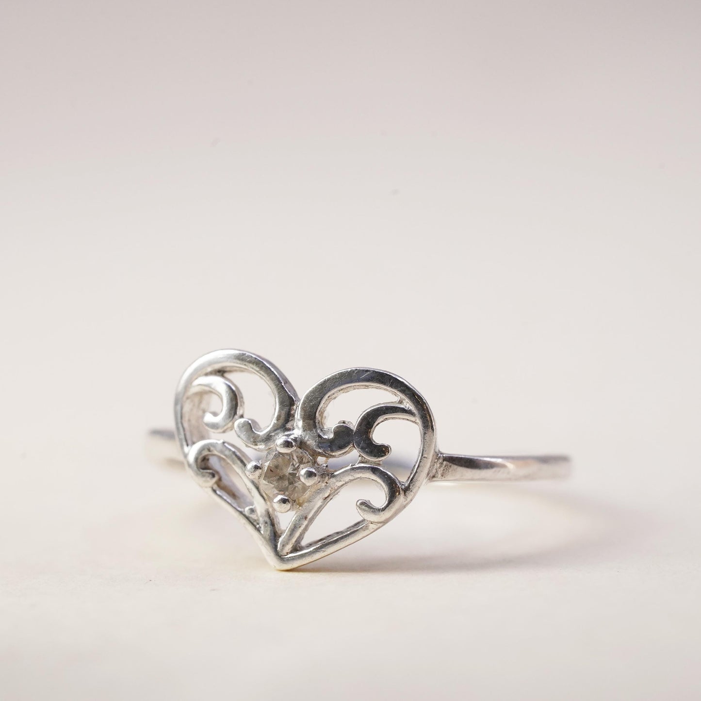 Size 7.25, Vintage sterling silver handmade ring, swirly heart ring with cz