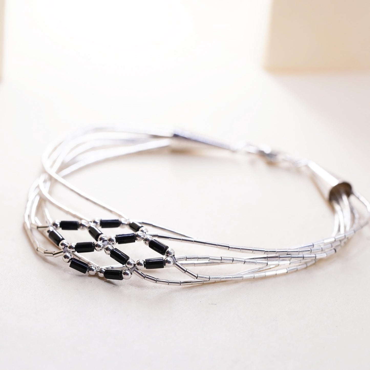 7”, Native American sterling bracelet, woven braided 925 liquid silver onyx