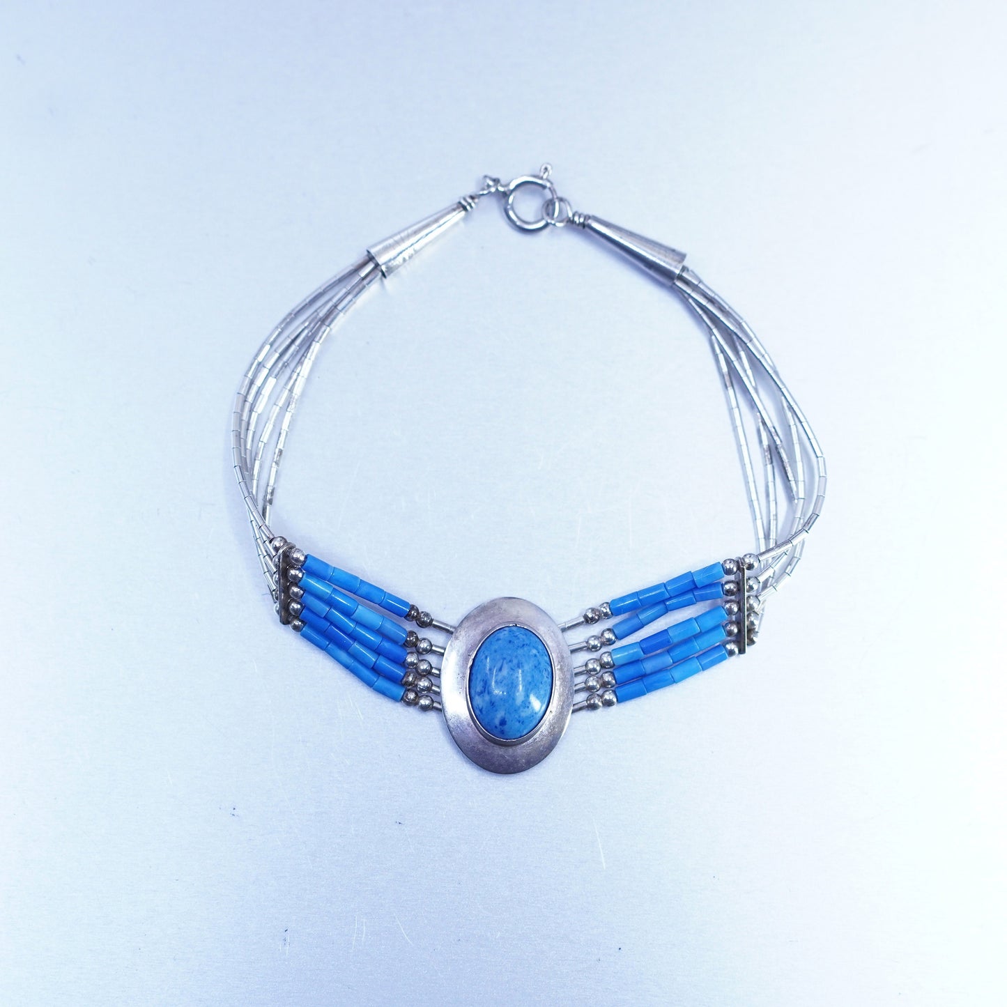 7.25”, Sterling 925 silver bracelet, liquid chain with denim lapis lazuli charm
