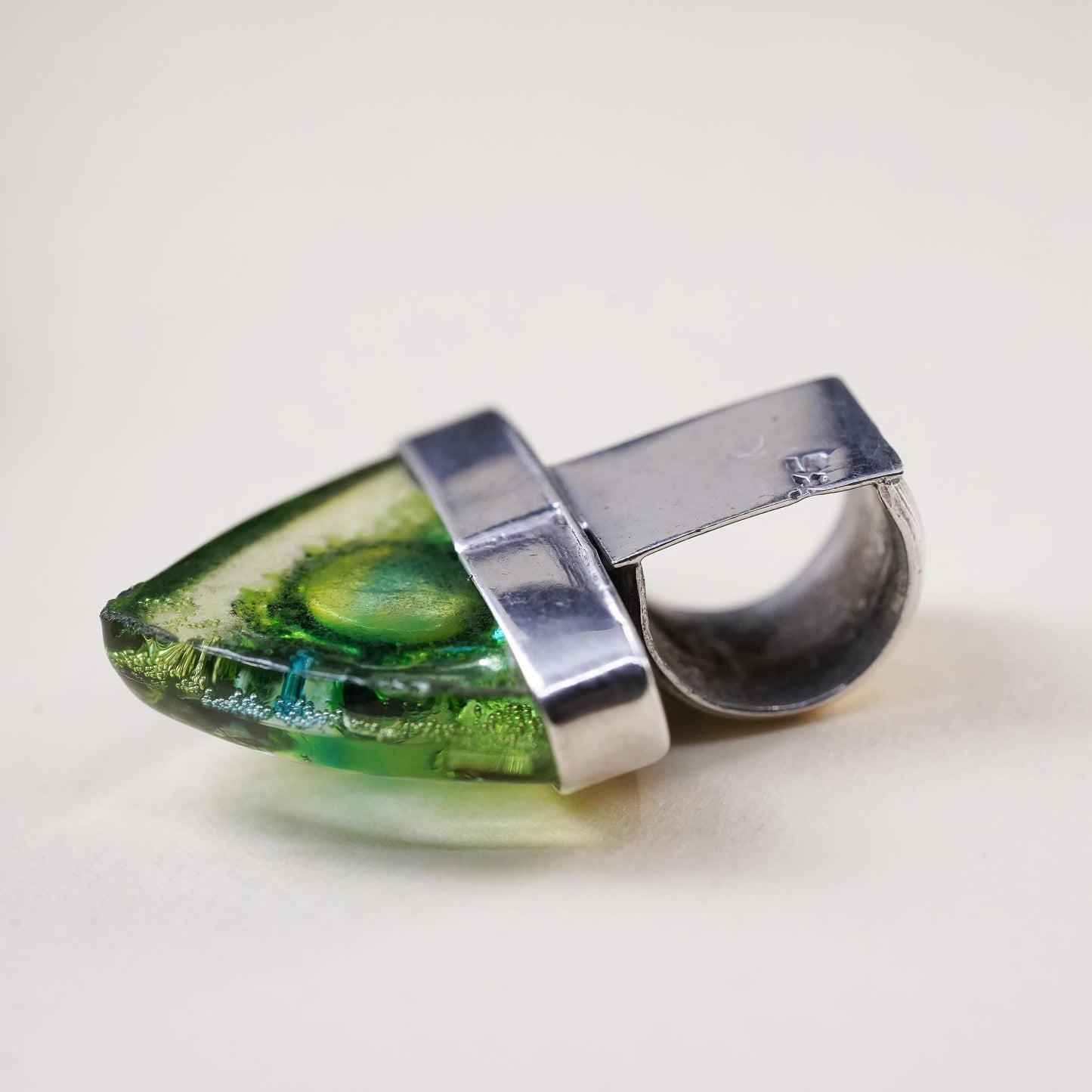 Vintage sterling silver with triangular green dichroic foiled glass pendant