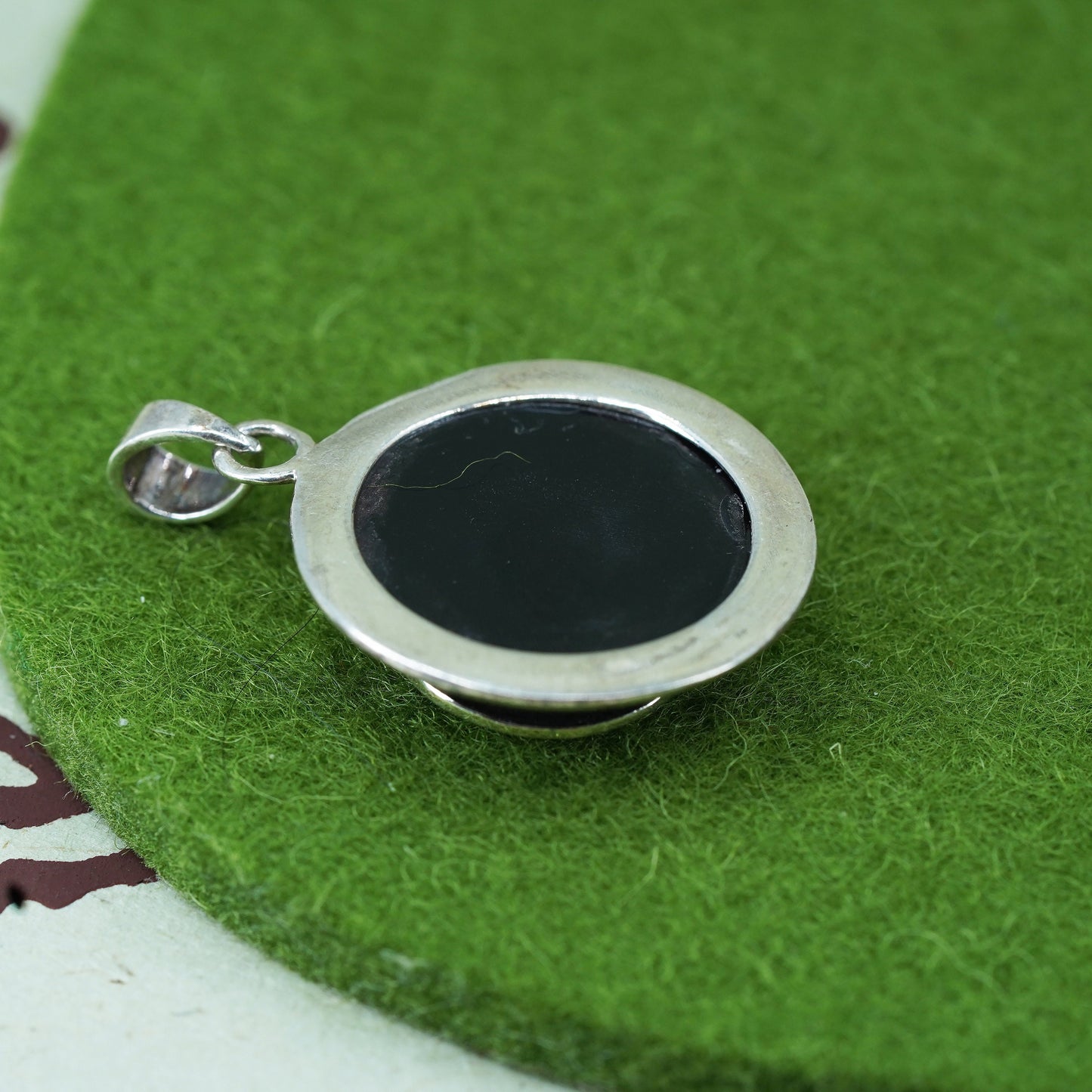 handmade sterling silver 925 pendant with round black onyx and spiral details