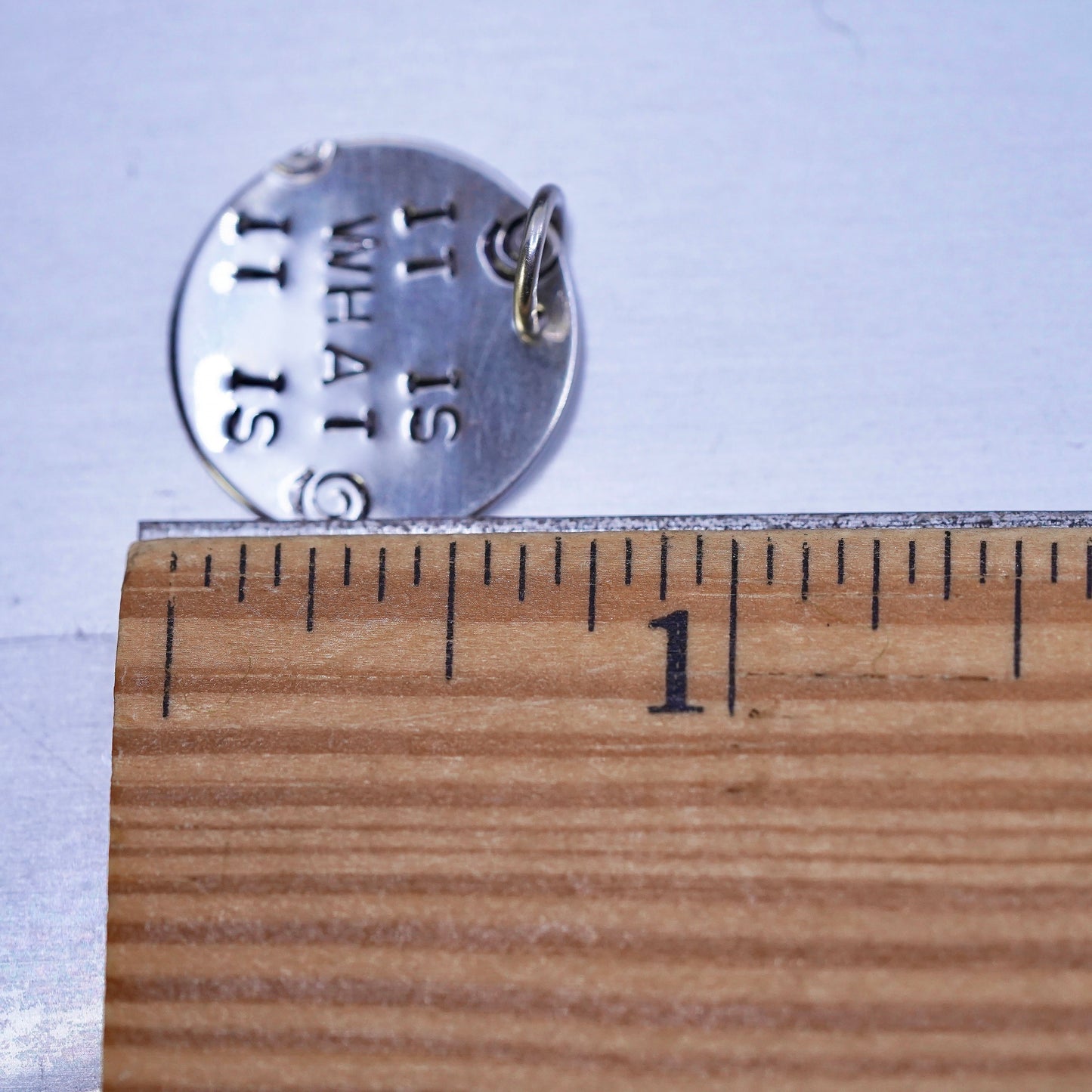 sterling silver handmade pendant, circle tag charm embossed “it is what it is”