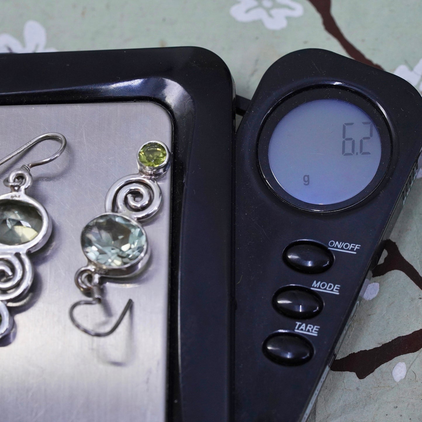 Vintage sterling 925 silver handmade earrings with peridot and spiral details