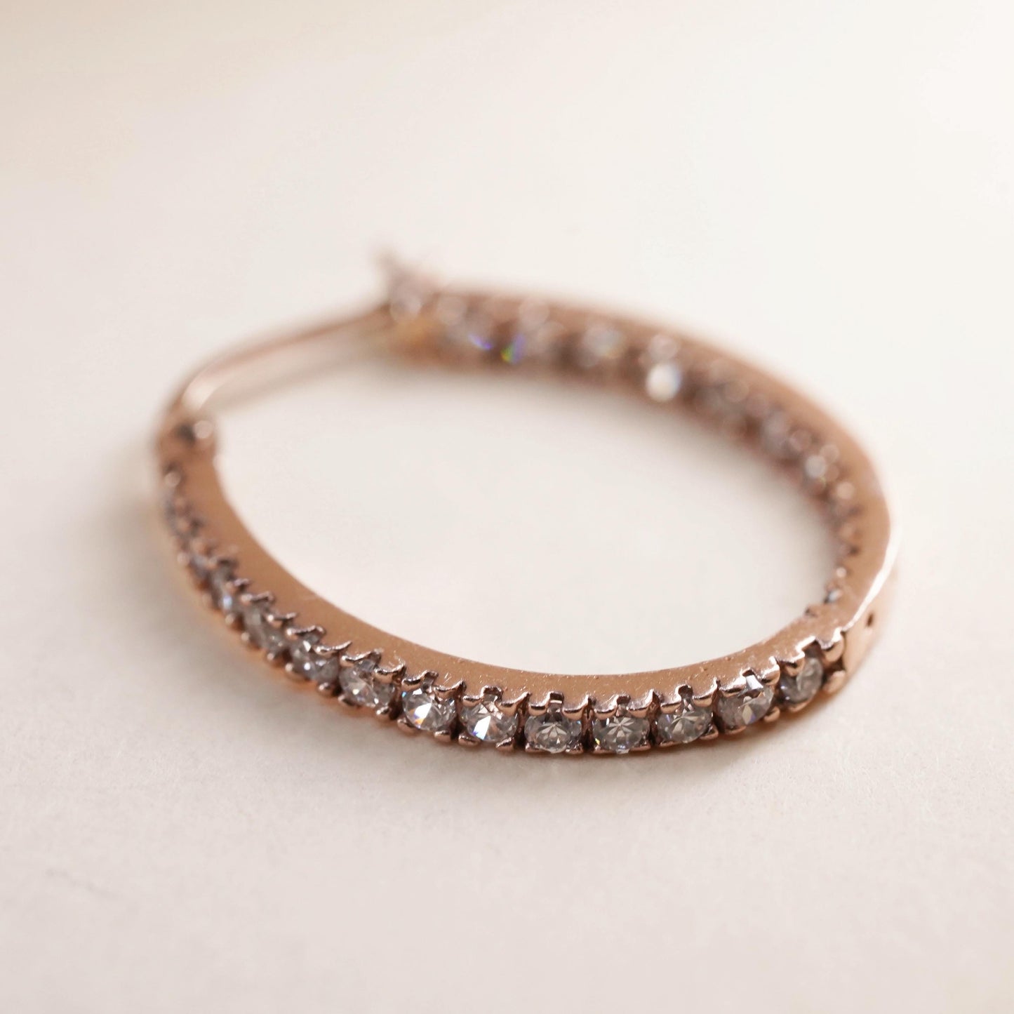 0.75", rose gold over sterling silver loop single earring, primitive hoop cz