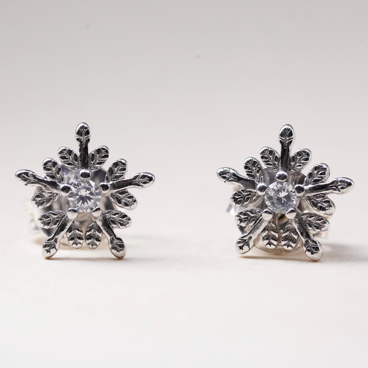 Vintage sterling silver clear crystal earrings, snowflake CZ studs