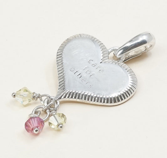 handmade sterling silver heart charm embossed “care for others”, 925 pendant