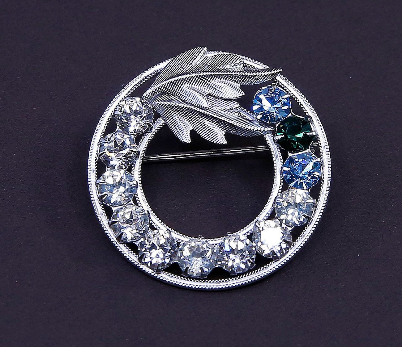 Vintage sterling 925 silver flower circle brooch with crystal and leaves