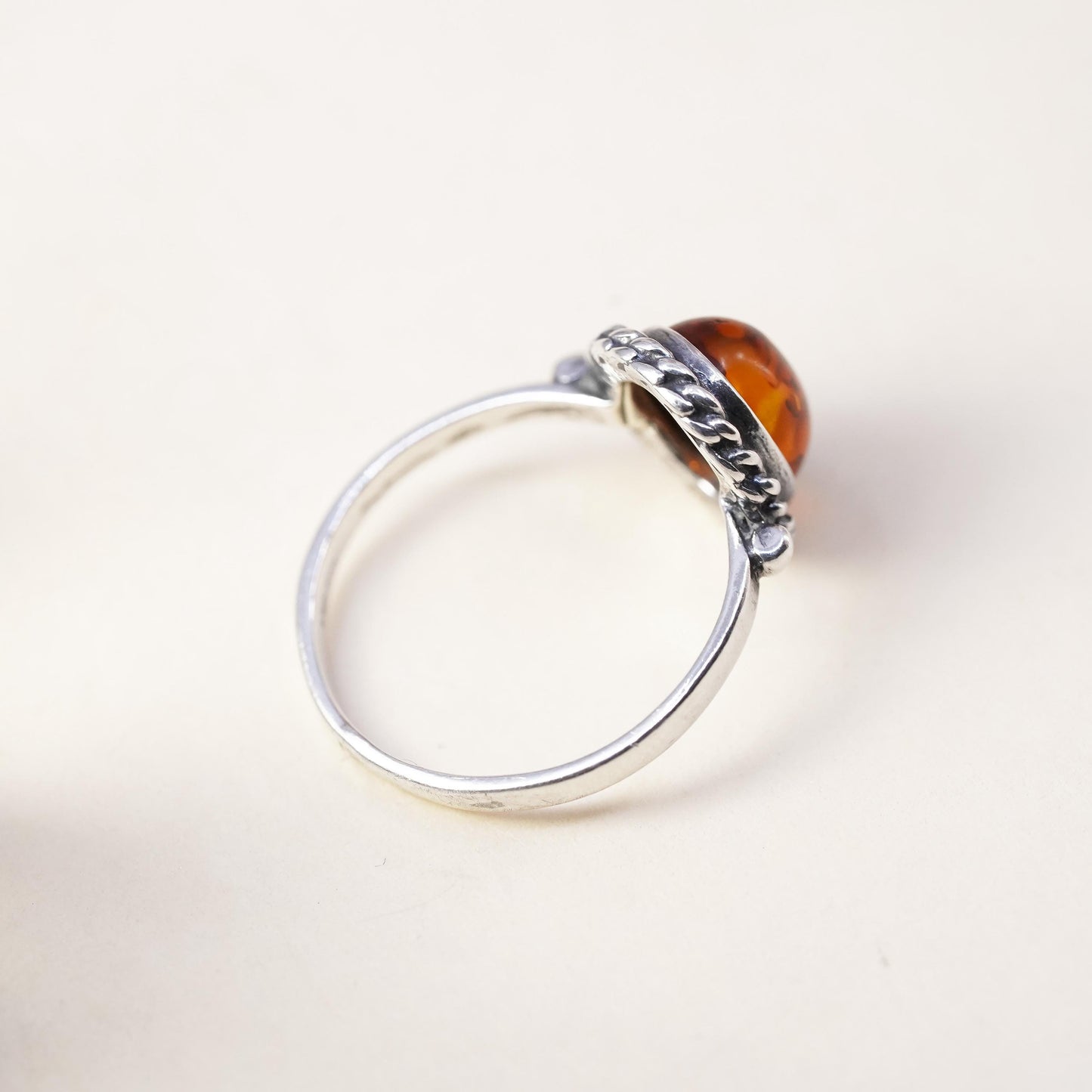 Size 5, Vintage sterling 925 silver handmade ring with Amber and cable around