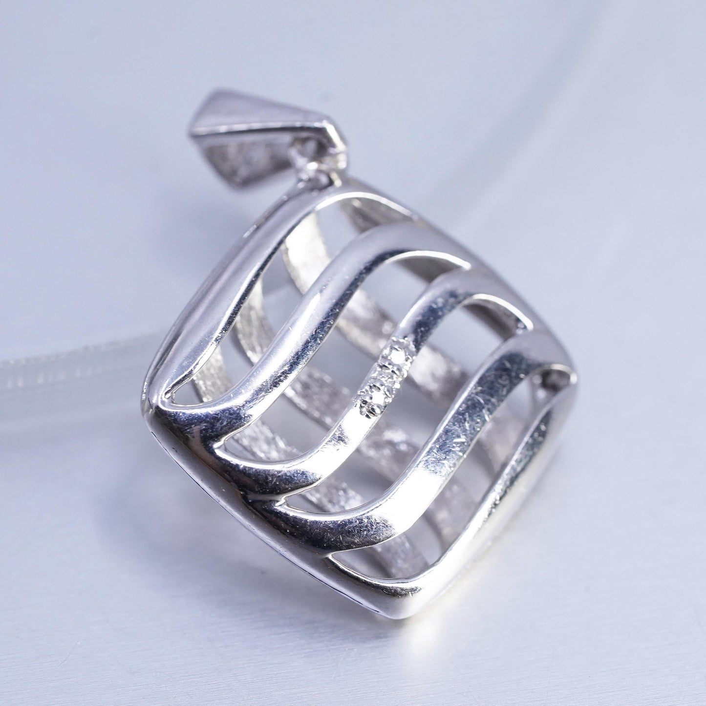 Vintage sterling 925 silver puffy wavy pendant with diamonds