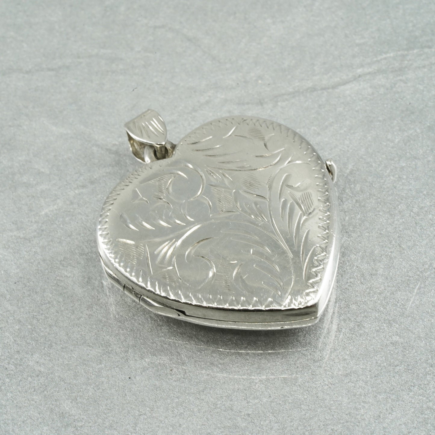 Vintage Sterling silver handmade charm, textured 925 heart photos locket