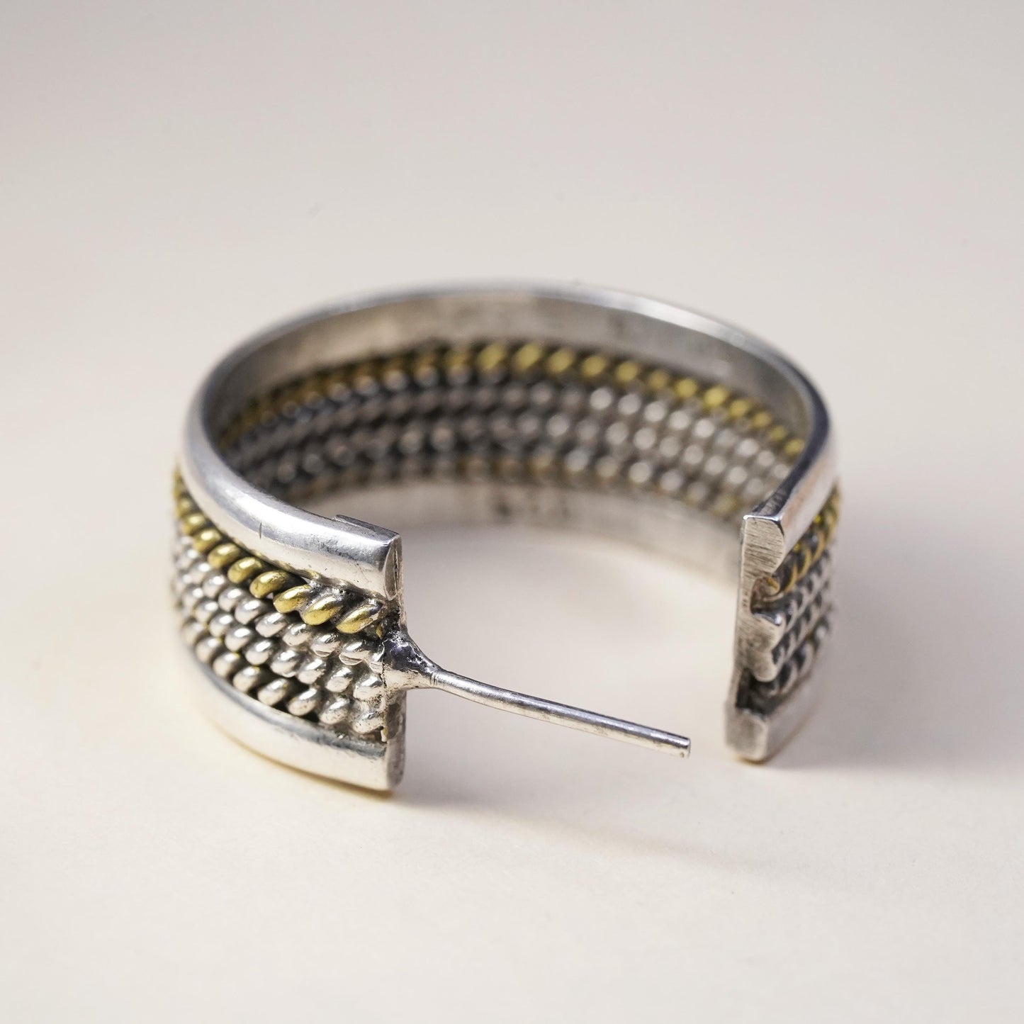 Vintage two tone Mexican single earring. Sterling 925 silver huggie stud