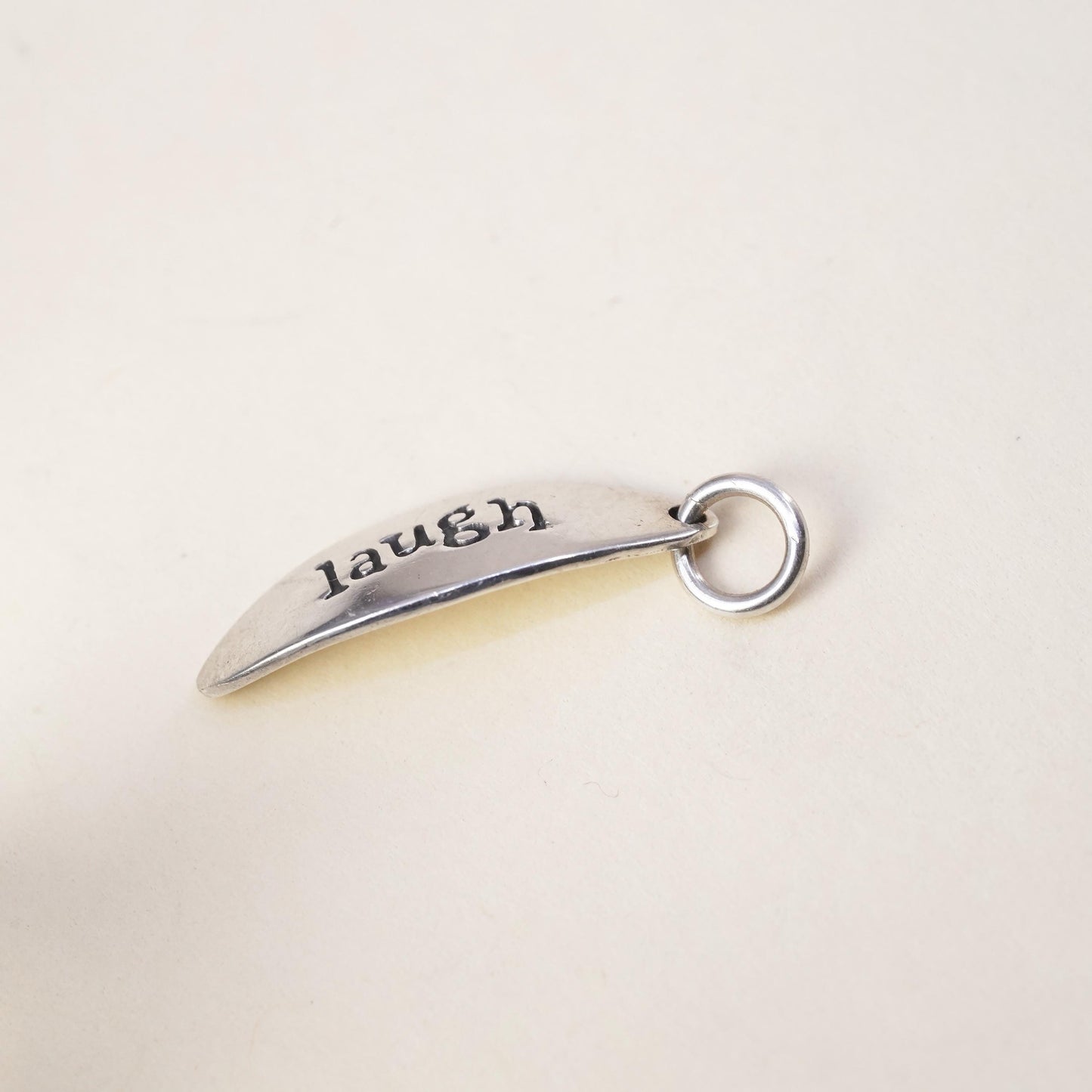 Vintage sterling silver tag charm embossed “laugh” 925 pendant, silver tested