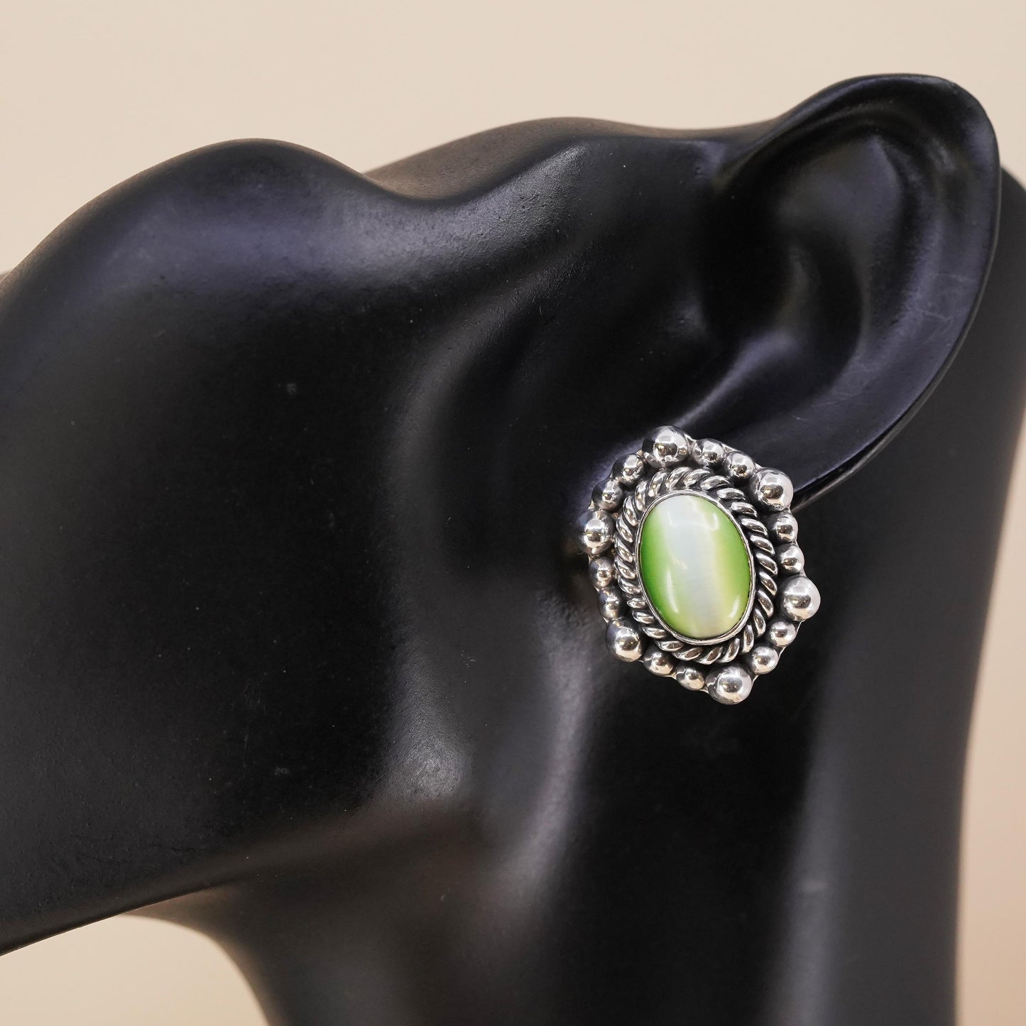 Mexican sterling silver single earring, 925 silver clip on with green cat’s eye