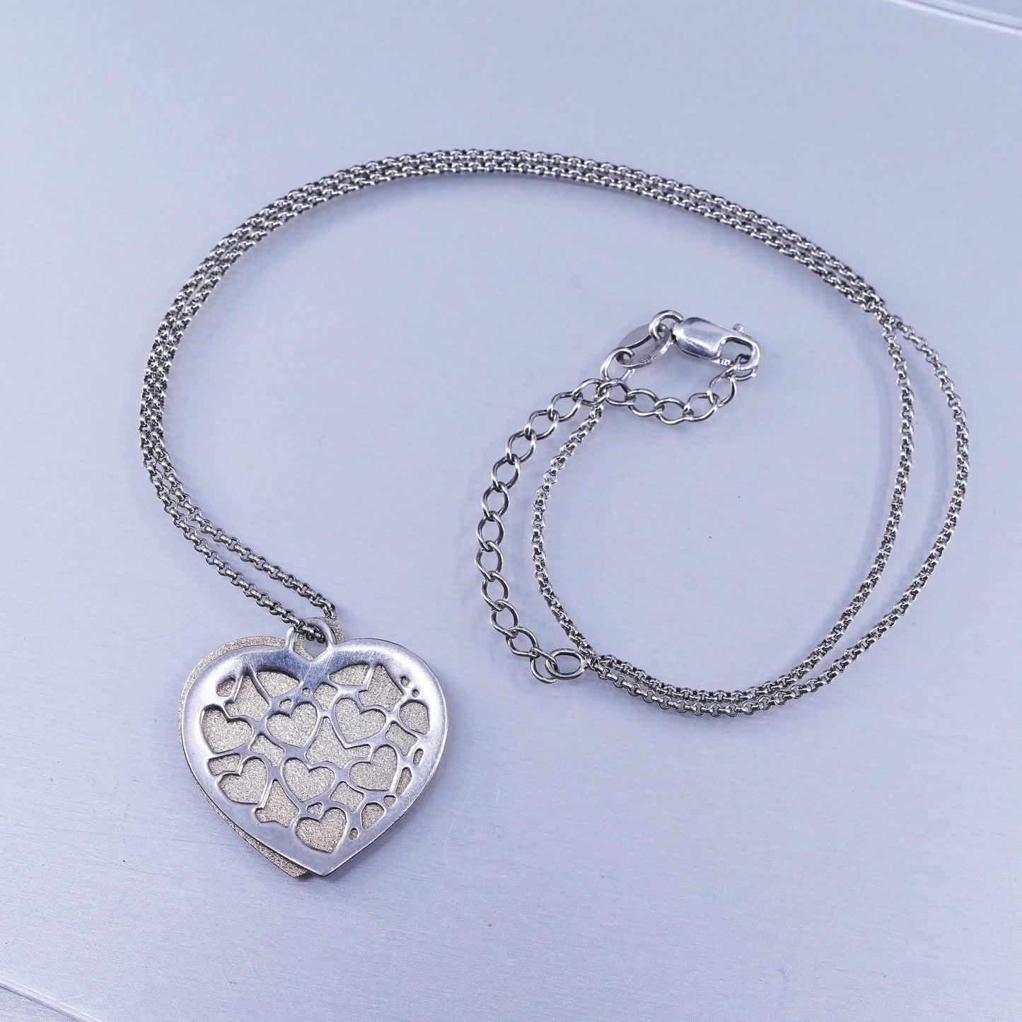 14+2”, vintage two tone Sterling 925 silver circle necklace with heart pendants