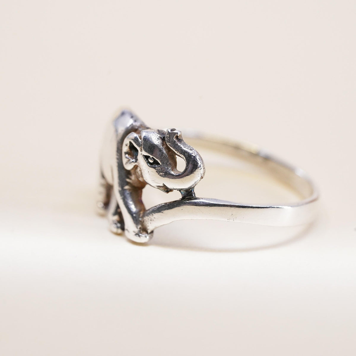 Size 8.25, vintage sterling silver handmade ring. 925 elephant band