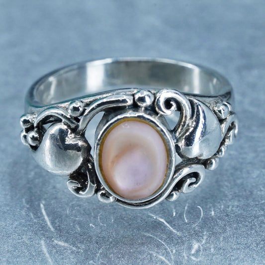 Size 8.25, Sterling 925 silver ring with pink mother of pearl and hearts around