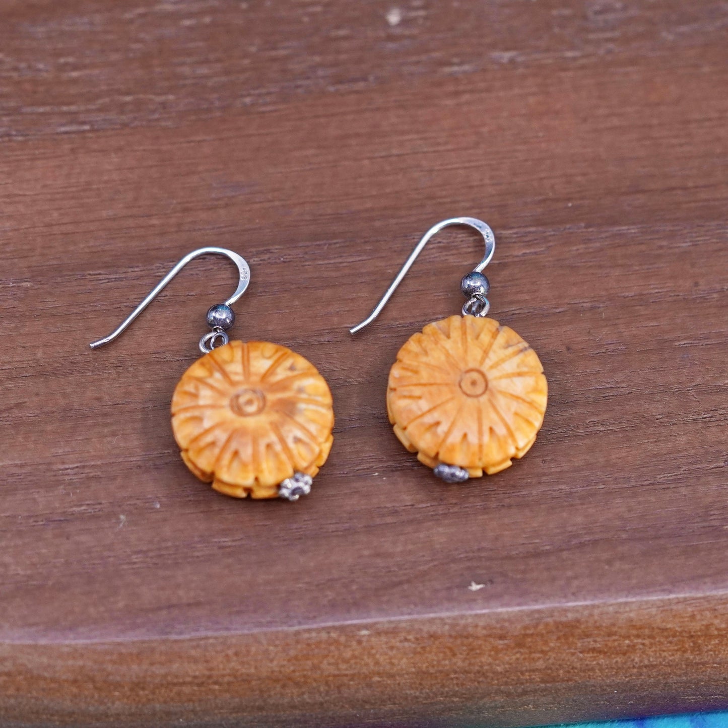 Vintage sterling silver handmade earrings with carved flower dangles