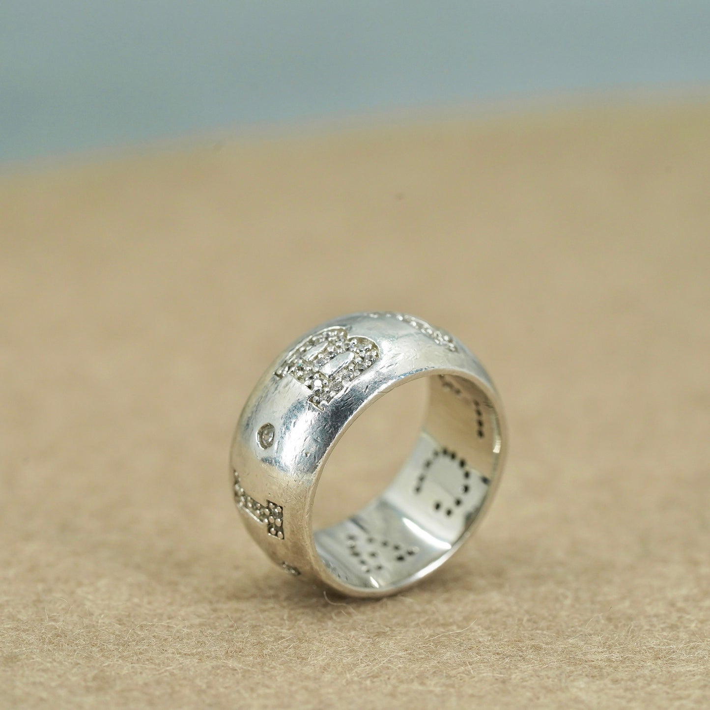 Size 7, VTG southwestern Sterling 925 silver wedding ring, Cz “bvlgari” band