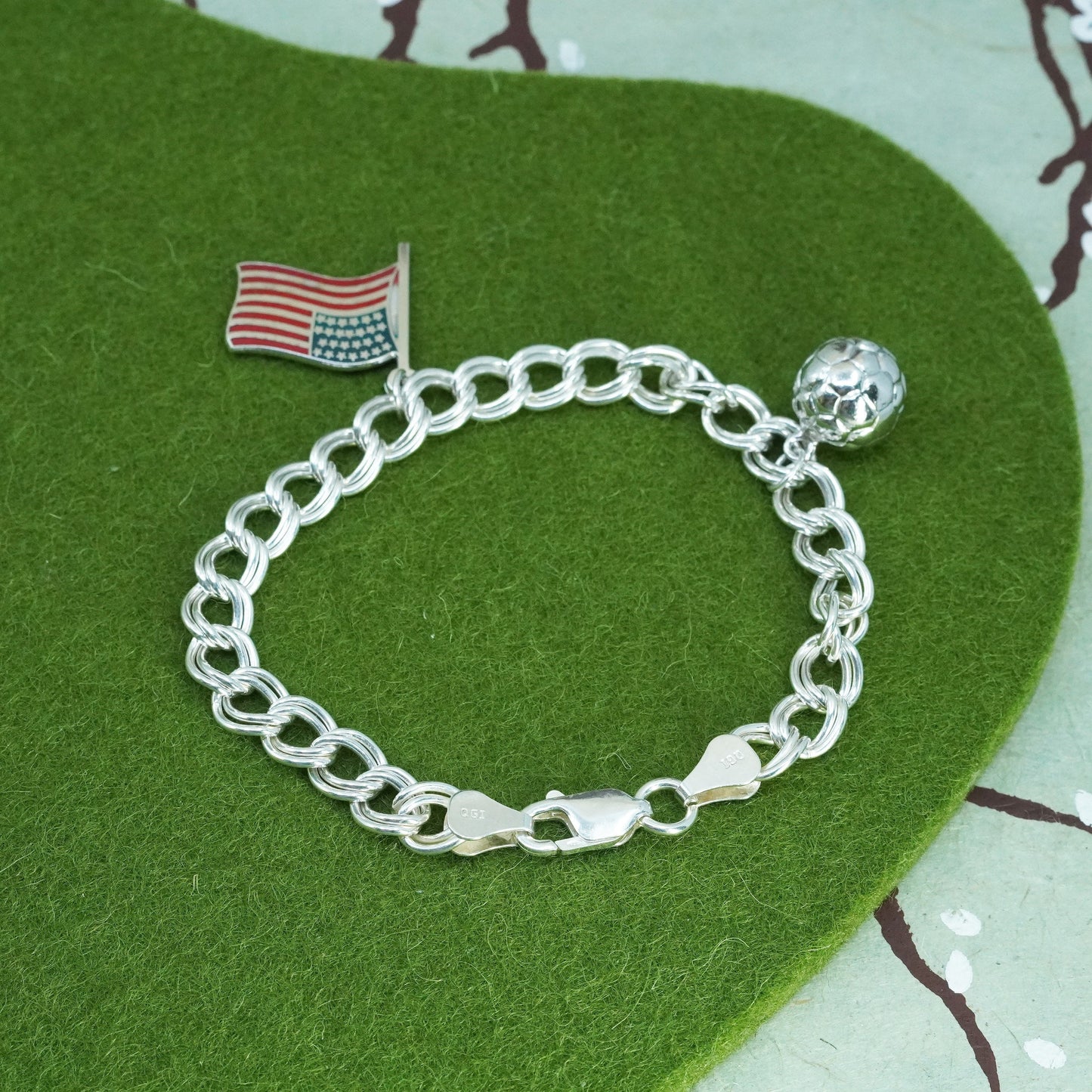 6.5”, sterling silver bracelet, 925 curb chain Soccer American flag charms