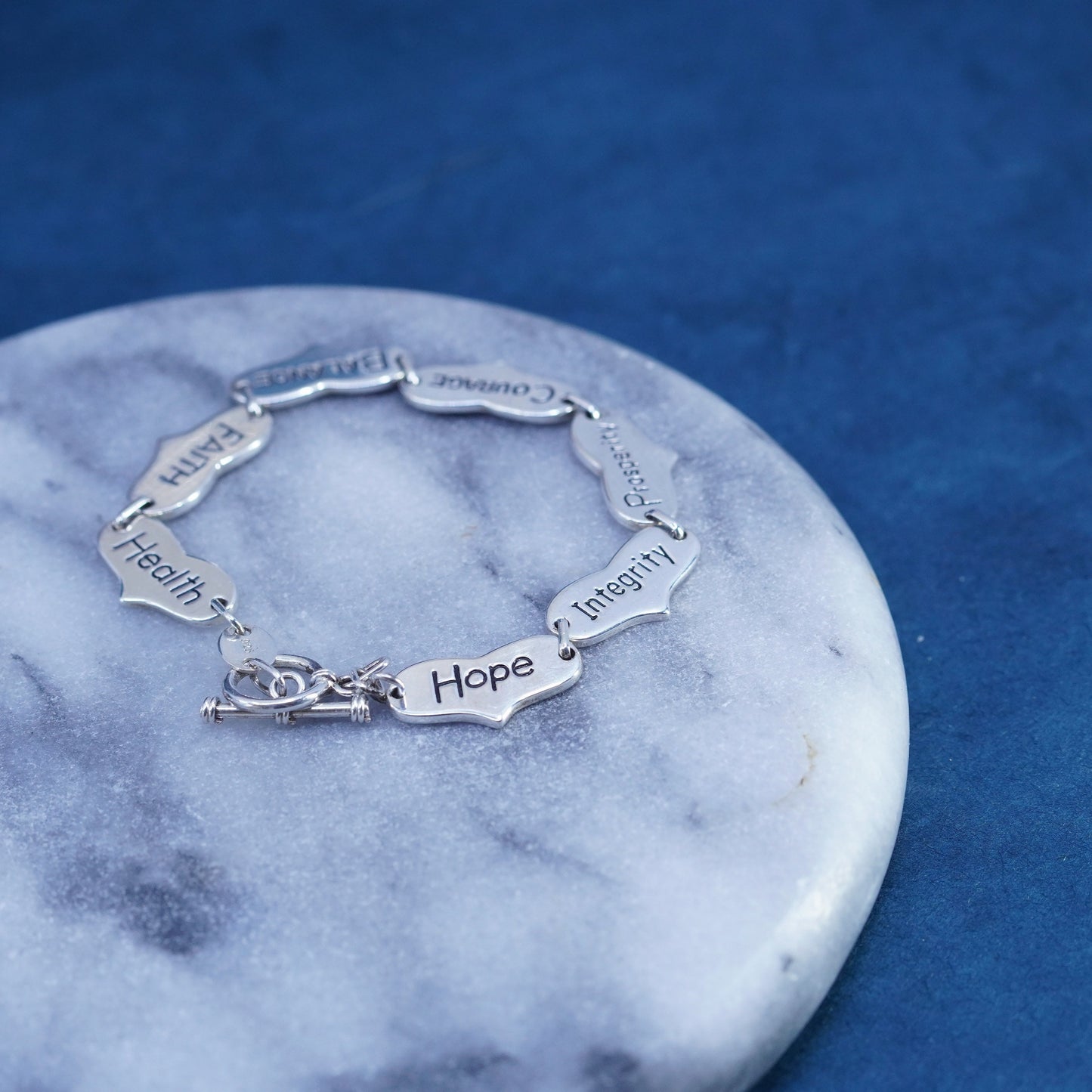 7.5”, Sterling silver bracelet, 925 heart chain embossed “love trust strength