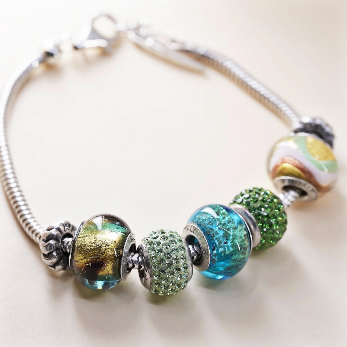 7.5", Ralph Lauren RL Sterling silver bracelet, 925 snake 5 green bead charms