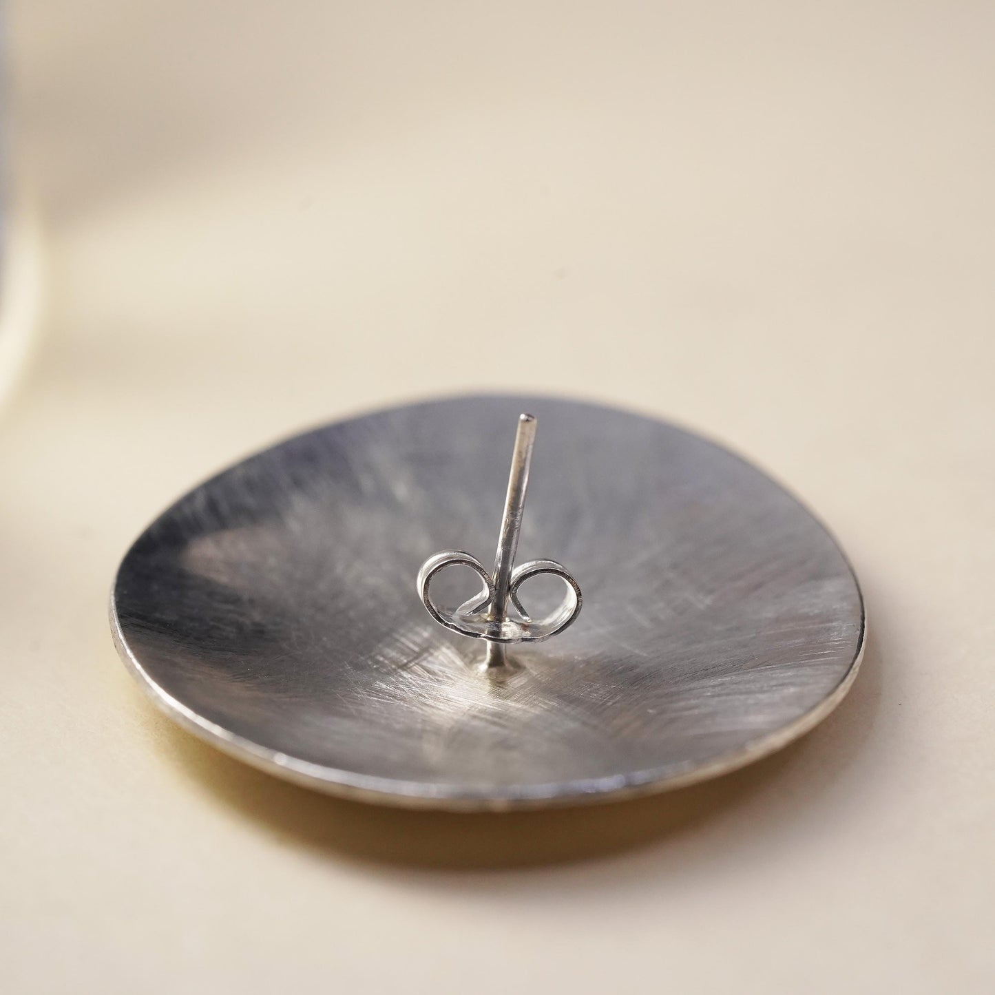 Vintage handmade single earring. Sterling 925 silver textured disc stud