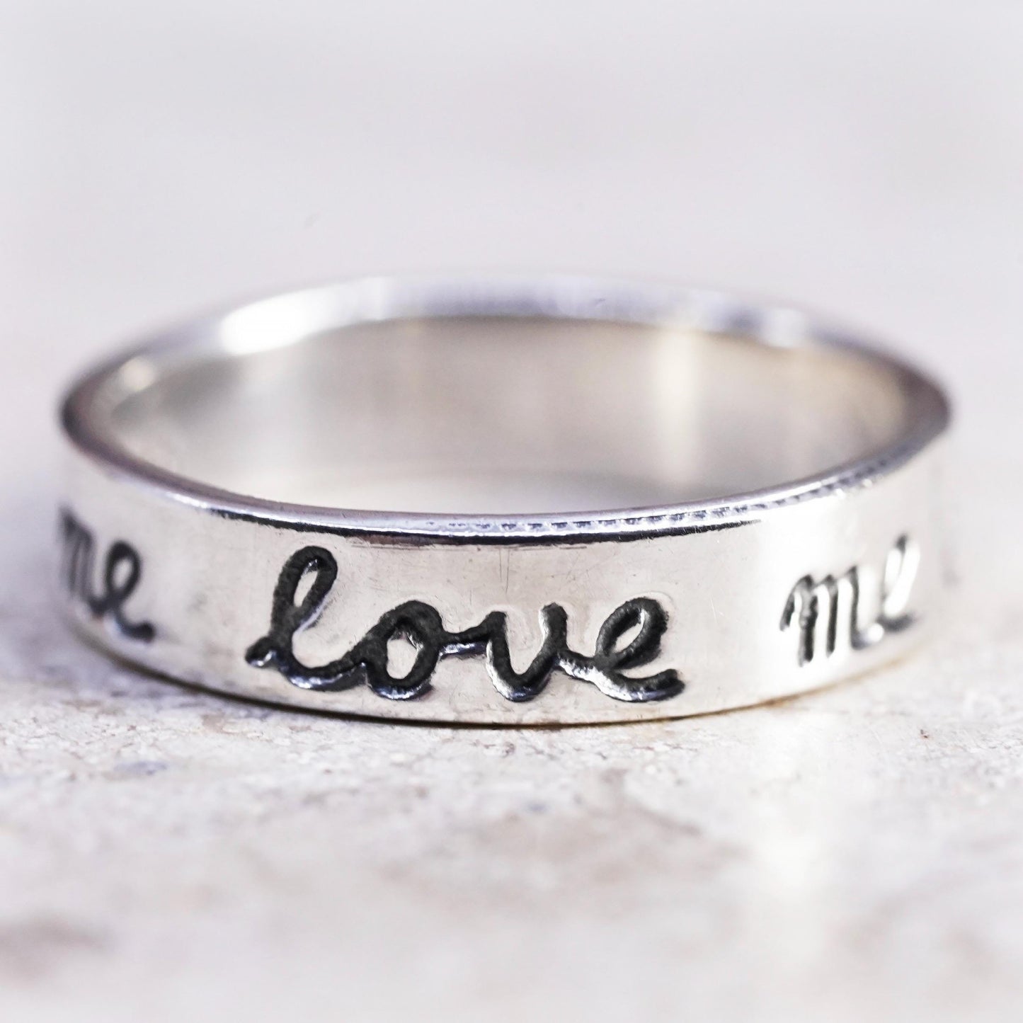 Size 6.25, VTG Sterling silver stackable ring, 925 band engraved "love me not"