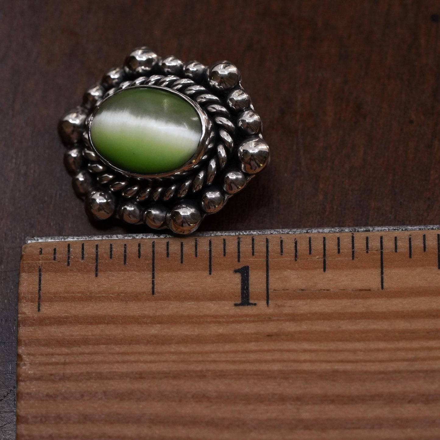 Mexican sterling silver single earring, 925 silver clip on with green cat’s eye