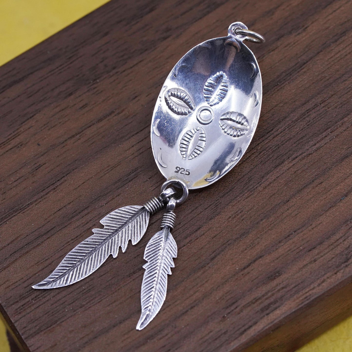 Sterling silver pendant, southwestern style, 2” 925 circle with feather dangle