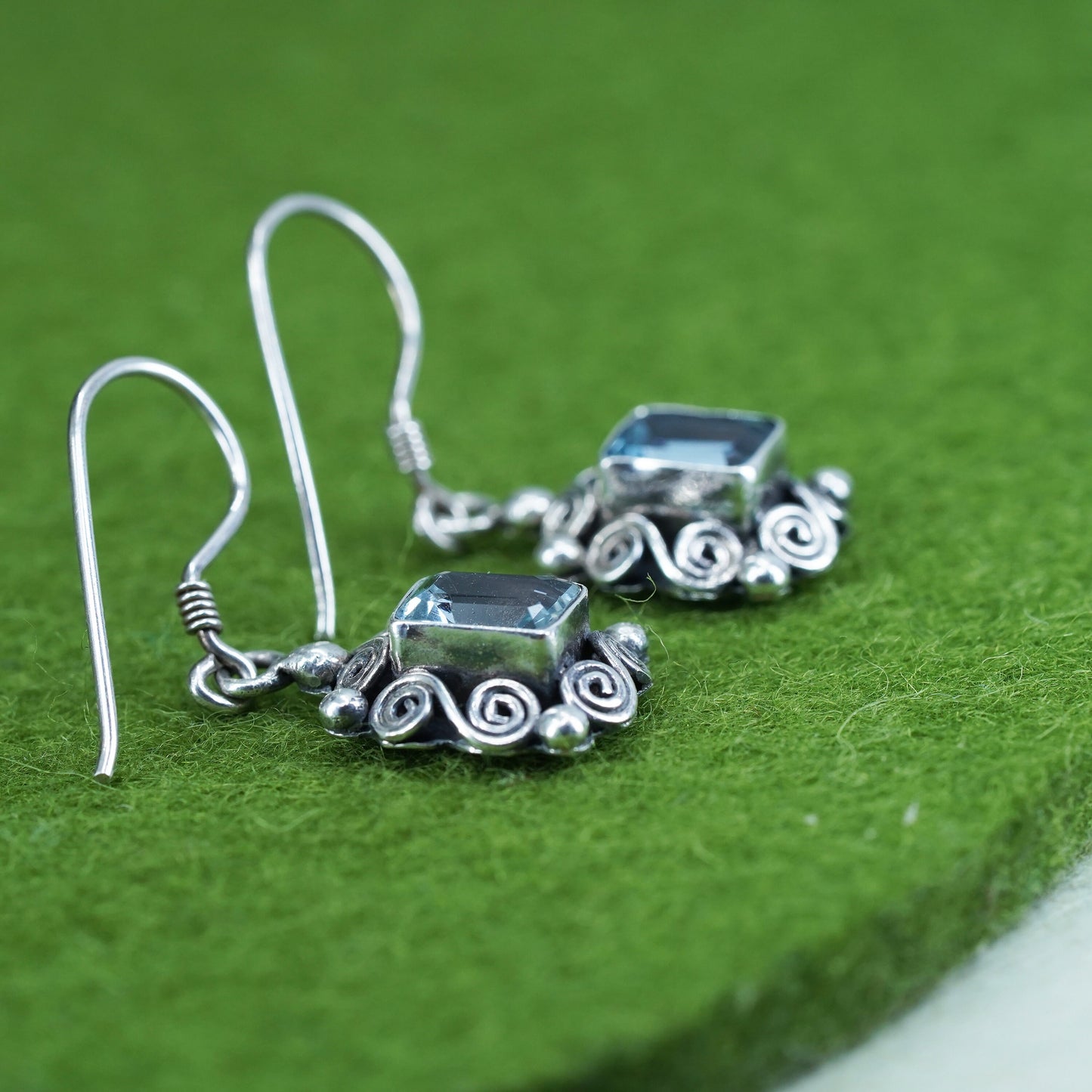 Vintage sterling silver 925 handmade earrings with blue topaz and sprial detail