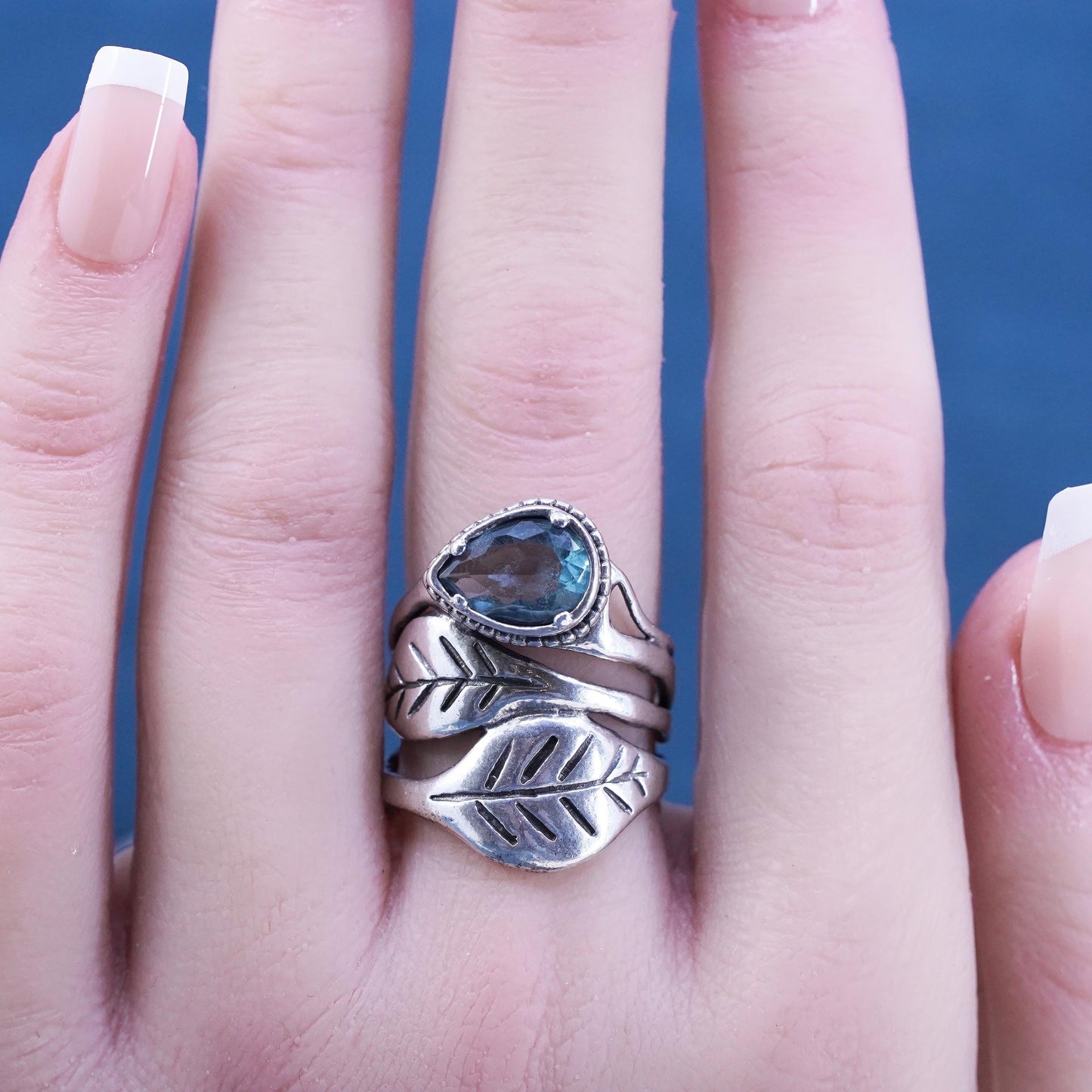 Size 8, vintage Israel Shablool Didae Sterling silver wavy ring with blue topaz