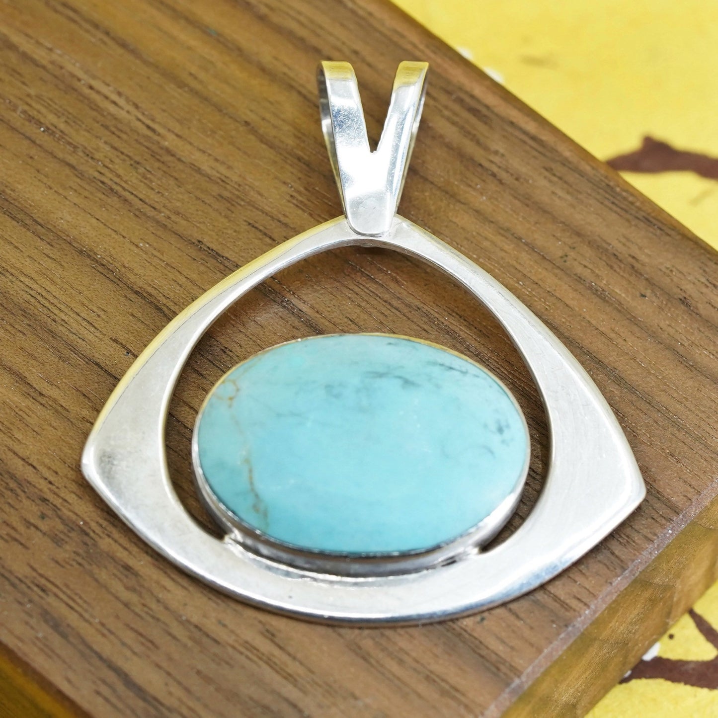 Vintage Sterling silver handmade pendant with oval turquoise