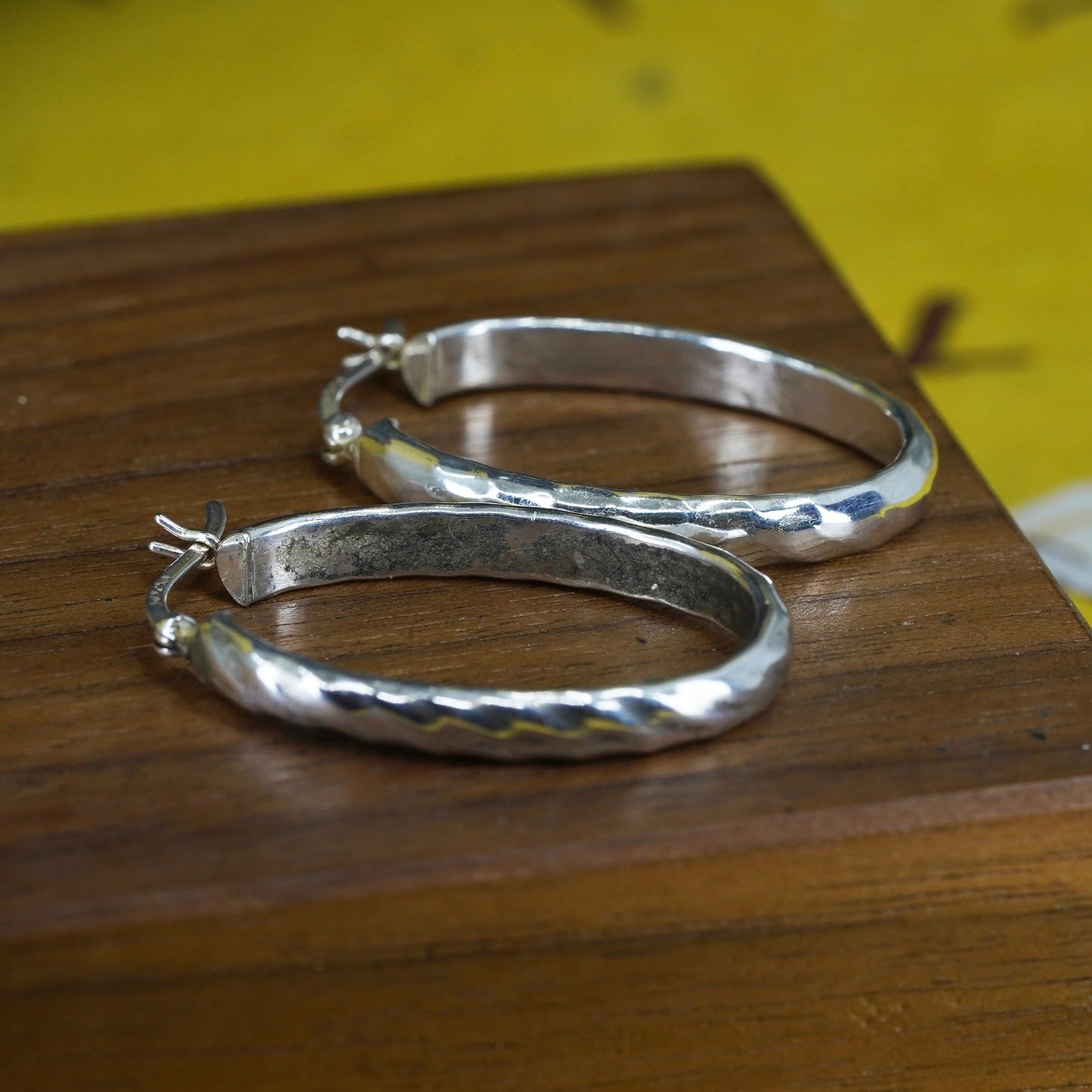 1.25", Sterling silver oval hoop earrings, textured 925 silver huggie
