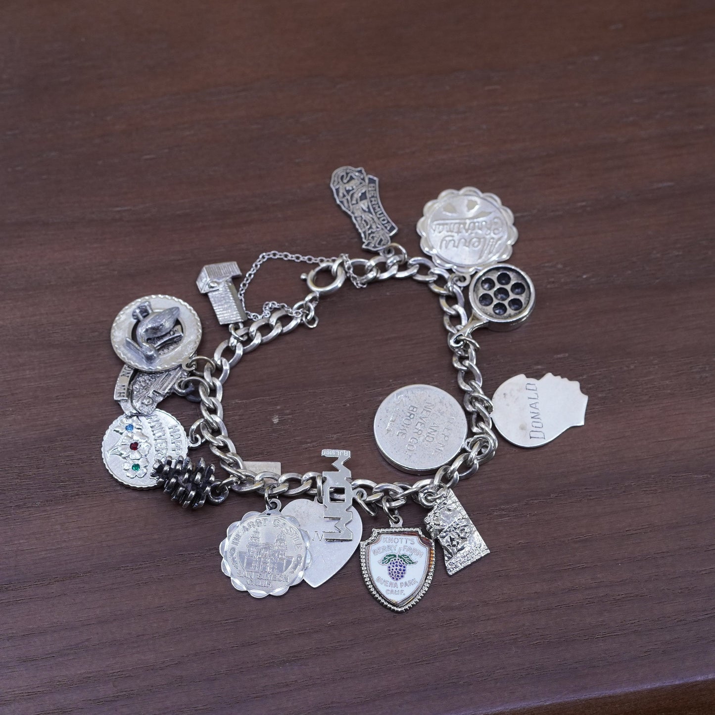 7”, vintage Sterling silver handmade bracelet, 925 curb chain with 15 charms