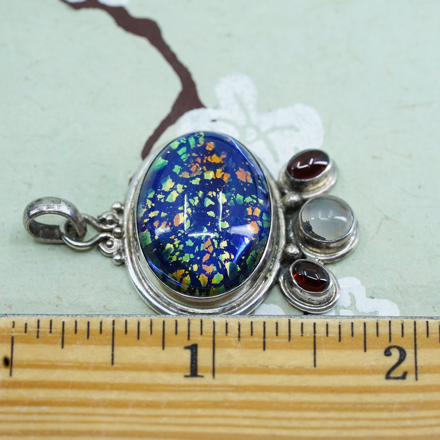 Mexico sterling silver with square dichroic foiled glass pendant garnet details