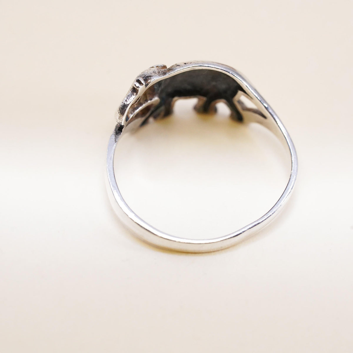 Size 8.25, vintage sterling silver handmade ring. 925 elephant band