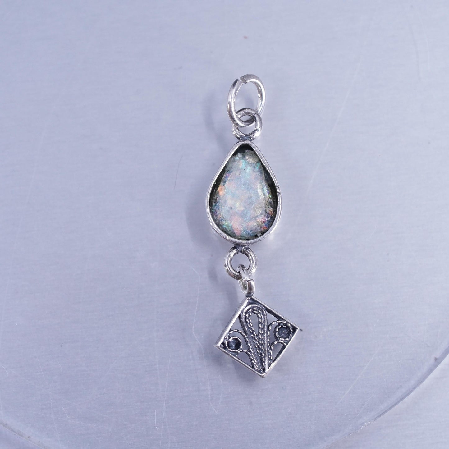 Vintage sterling 925 silver filigree teardrop pendant with dragon breath glass