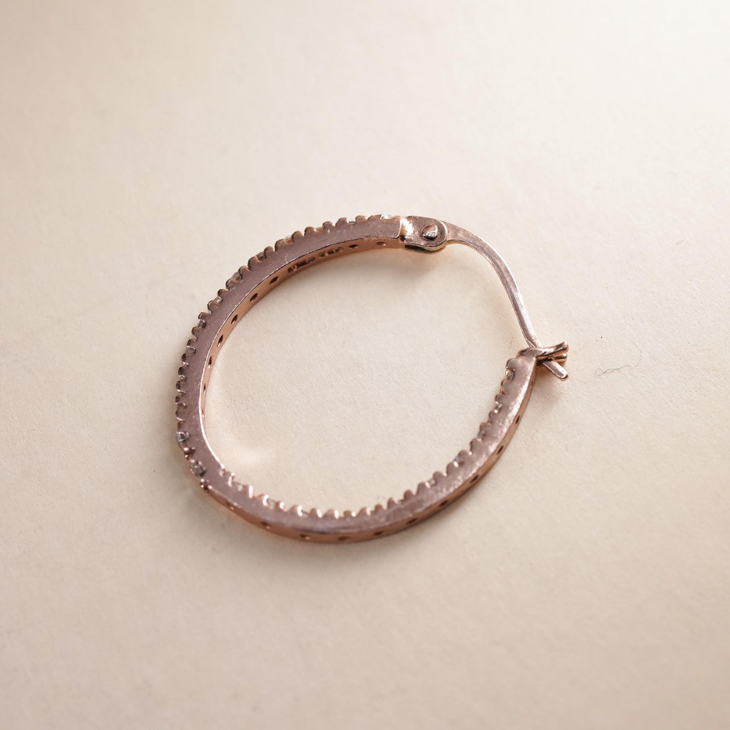 0.75", rose gold over sterling silver loop single earring, primitive hoop cz