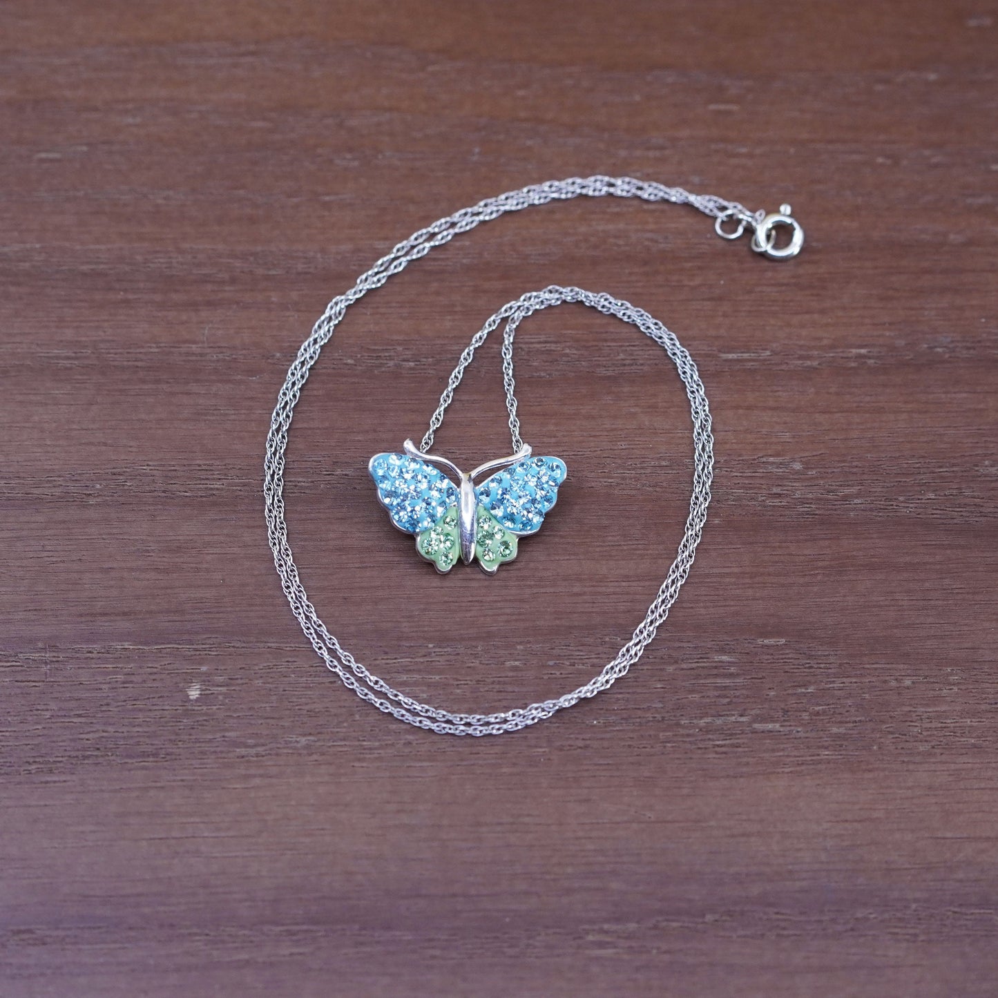 18”, Sterling silver necklace, 925 Singapore rope chain w/ butterfly pendant cz
