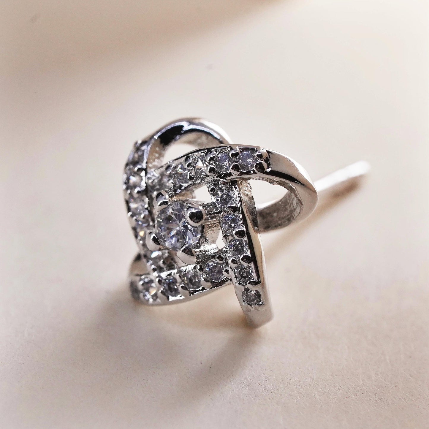 Vintage handmade single earring. Sterling 925 silver cz entwinted stud