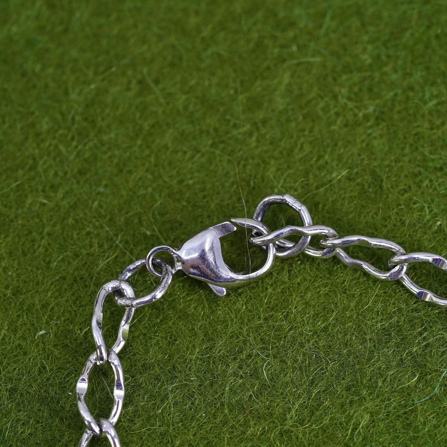 6.75”, sterling 925 silver twisted curb bracelet and cross double heart charms