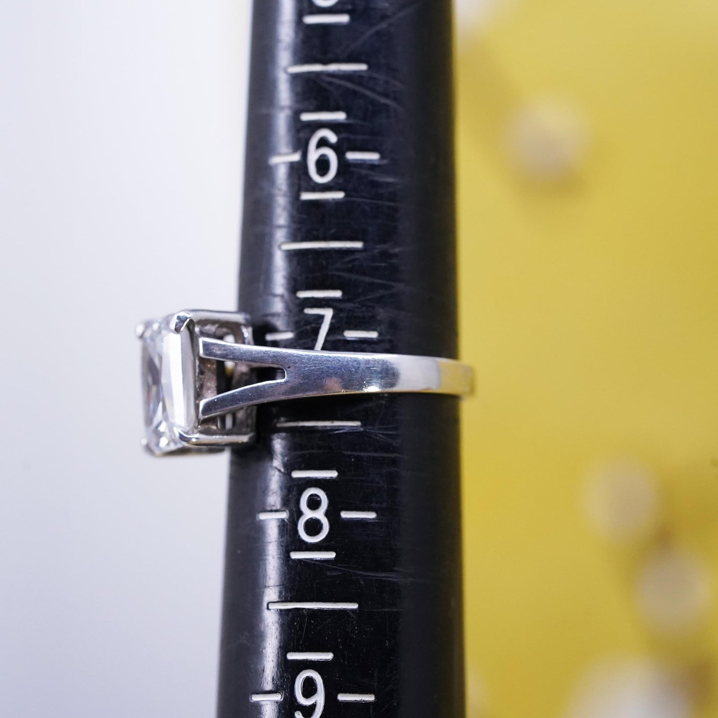 Size 7, vintage Sterling 925 silver anniversary ring with clear emerald cut cz