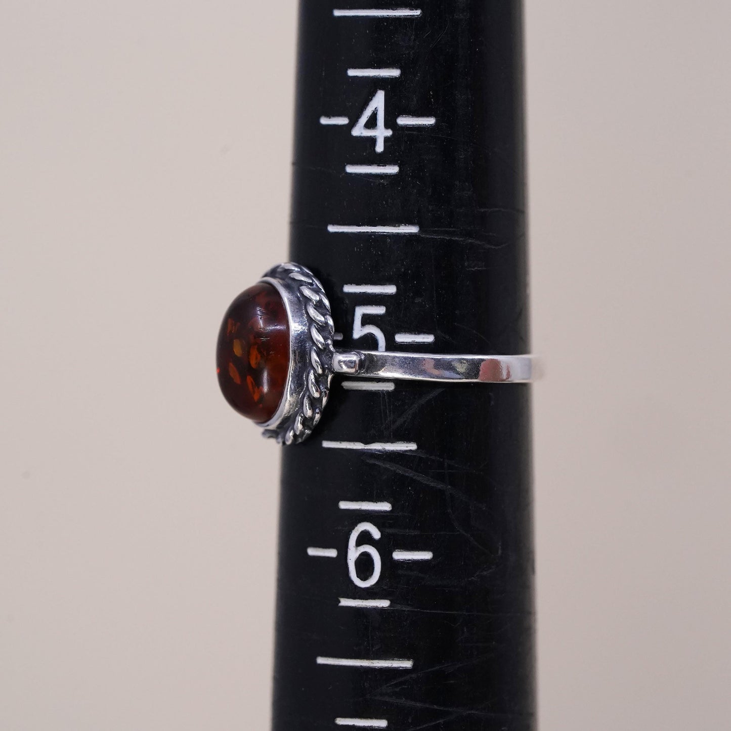Size 5, Vintage sterling 925 silver handmade ring with Amber and cable around