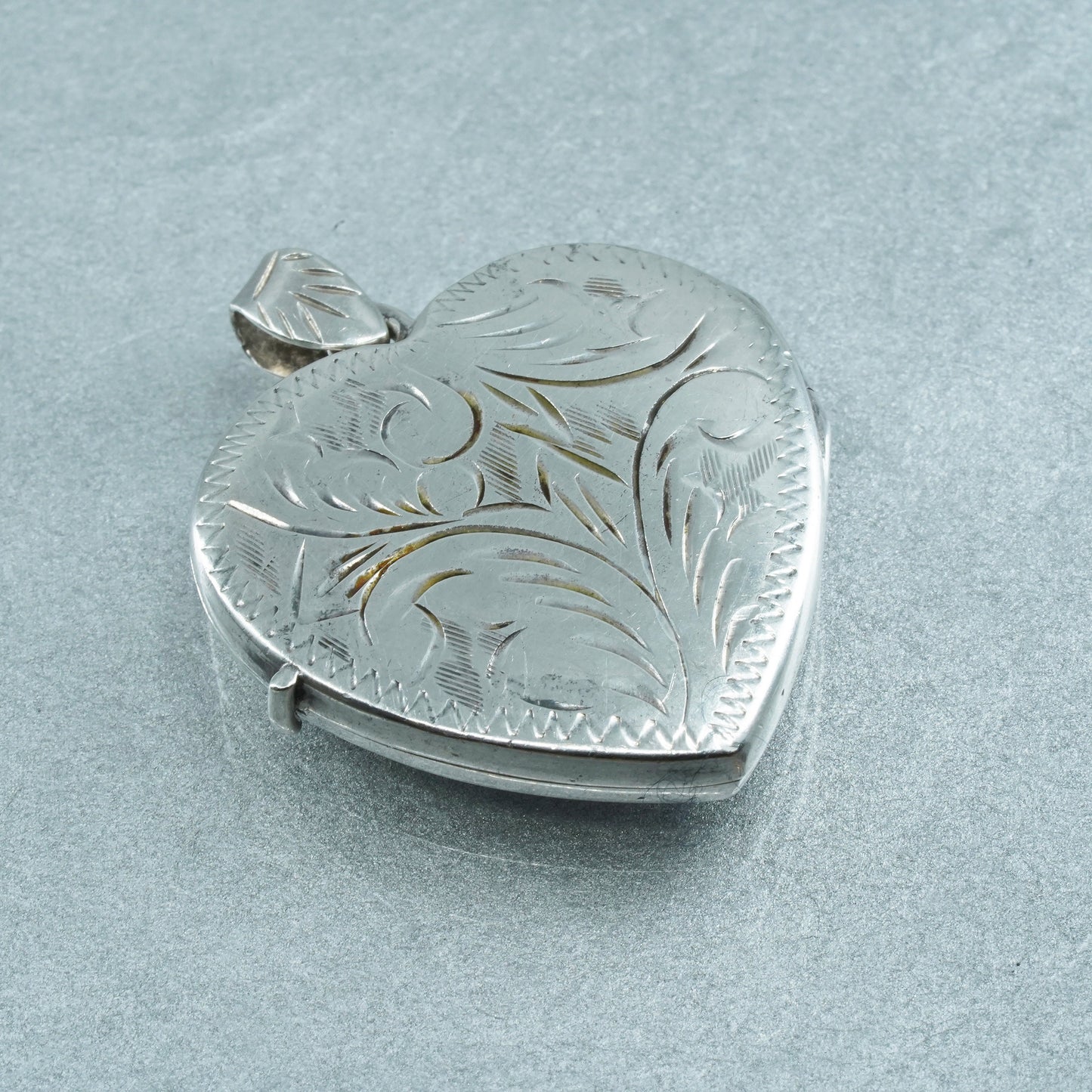 Vintage Sterling silver handmade charm, textured 925 heart photos locket