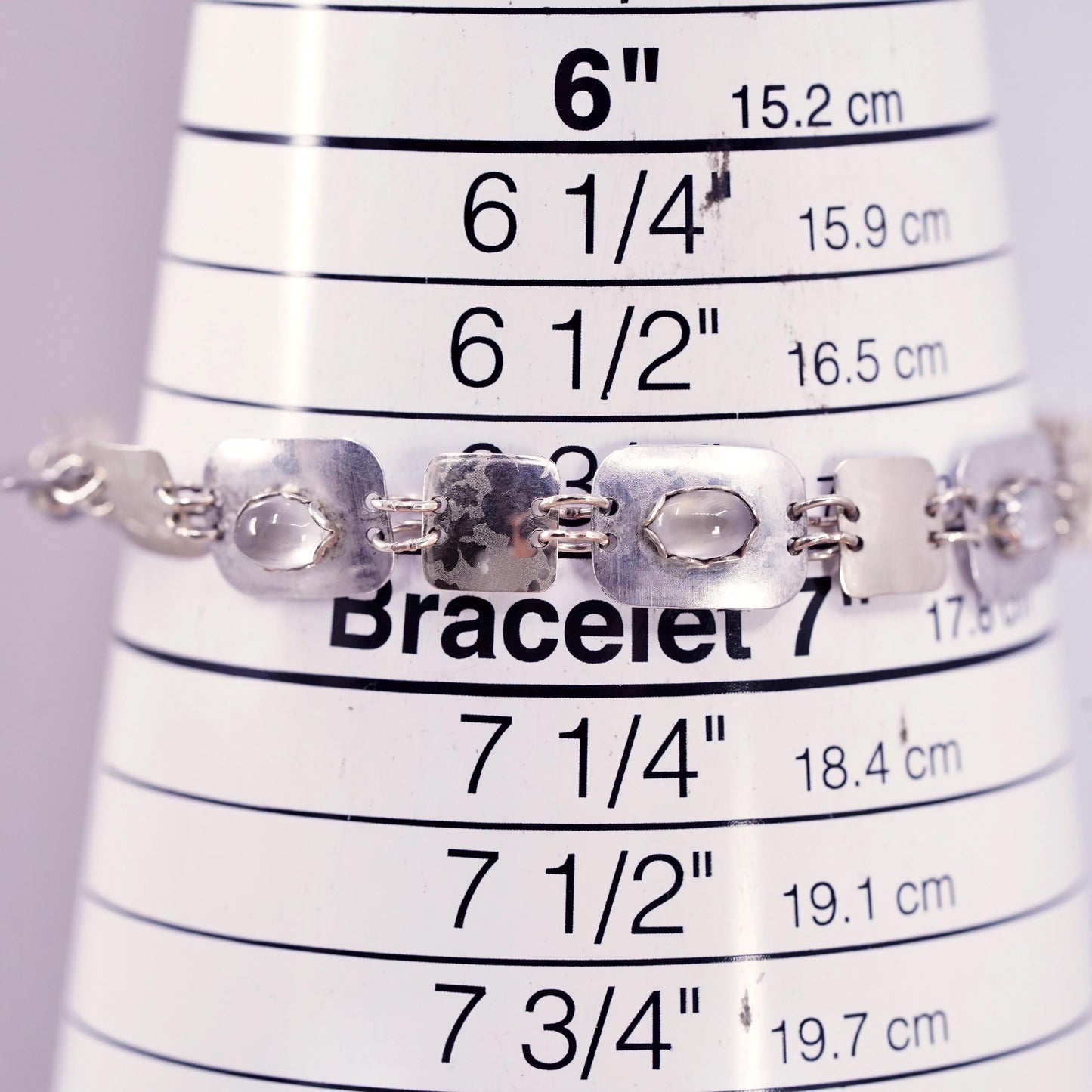6.75", two tone sterling silver bracelet, with 14K gold filled discs cats eye